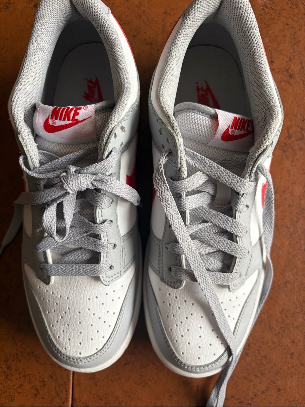 Nike White and Light Gray Low Top Sneakers with Red Swoosh